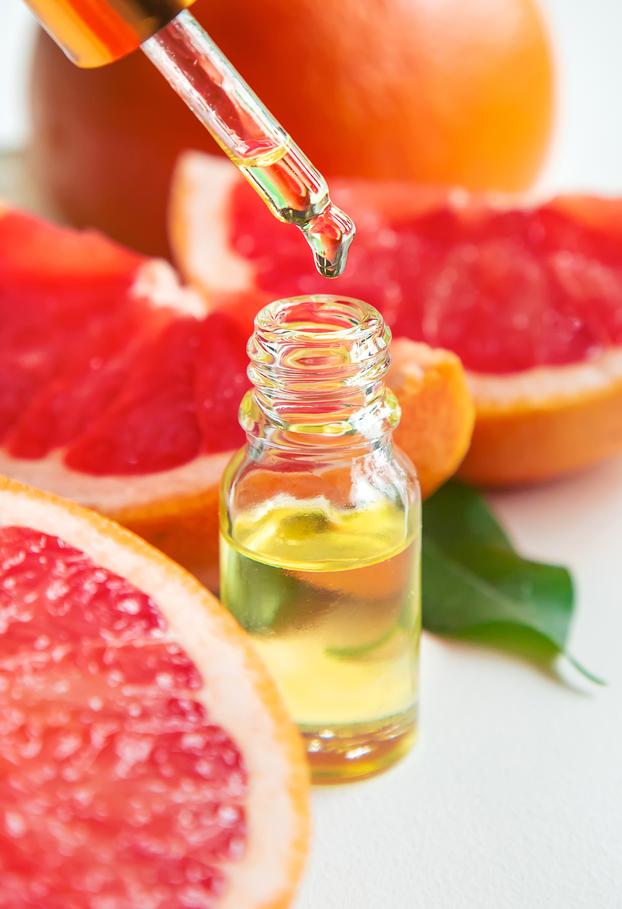 Grapefruit essential oil in a small bottle.