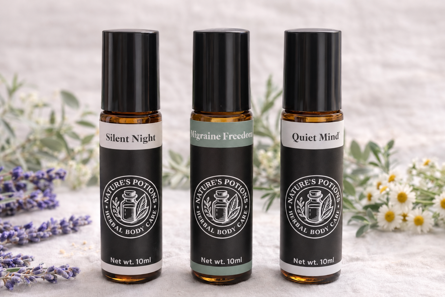 Quiet Mind, Silent Night, and Migraine Freedom roller bottles displayed side by side